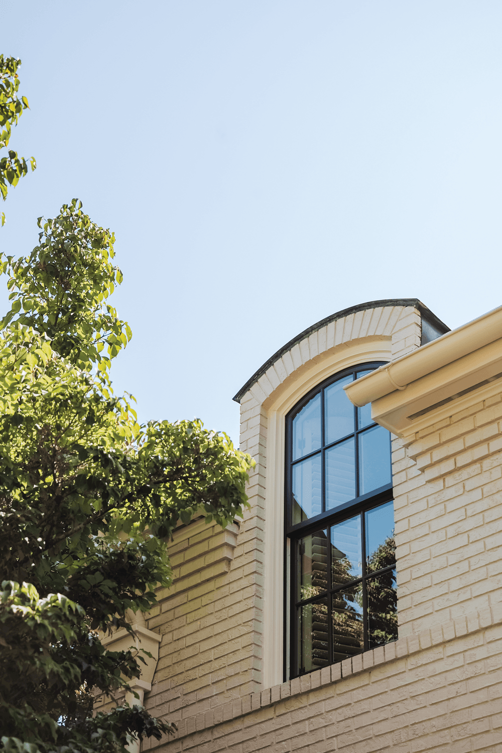 An exterior view of a dormer with Infinity windows.