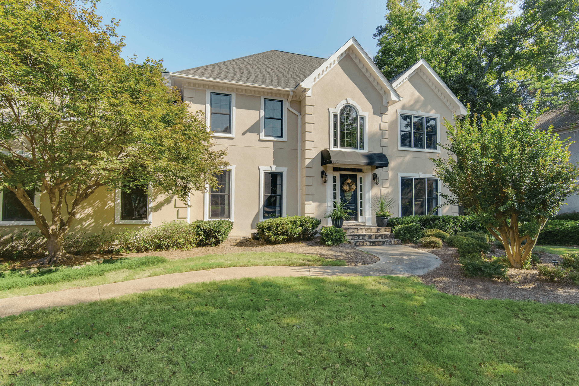 The exterior of a home with Infinity from Marvin windows.