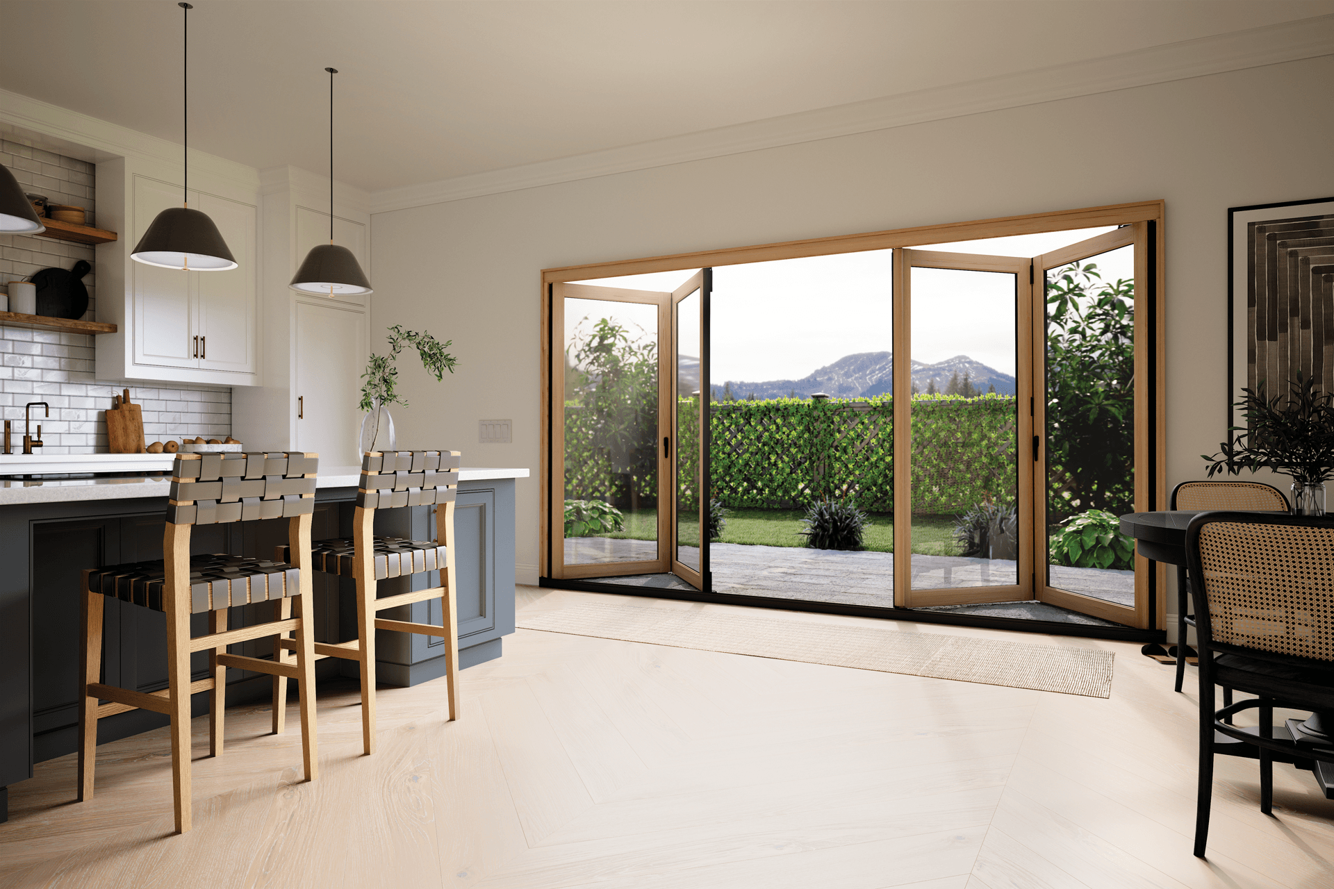 A kitchen featuring an open Infinity from Marvin bi-fold door.