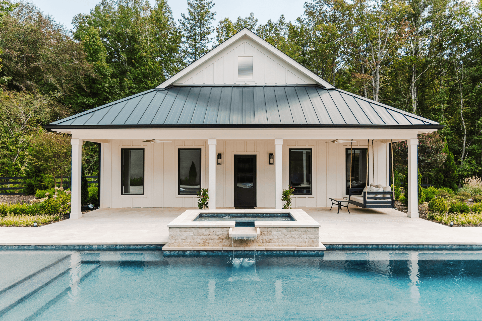 A pool house with Infinity from Marvin windows.